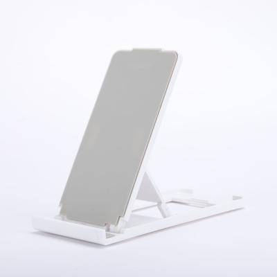 China Universal Dual Folding Adjustable Mobile Phone Holder Portable Lazy Tablet Holder Mobile Phone Stand Accessories for sale