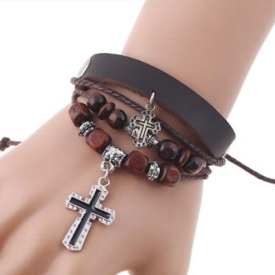 China Graceful Vintage Leather Bracelet Beaded Woven Wooden Beads Beaded Cross Bracelet Vintage Leather Bracelet for sale