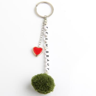 China New Release Fashion DIY Letter Beads Bag Charms Name Letter Bead Key Chain Fur Ball Inspired Words Letter Alphabet Keychain For Gifts for sale