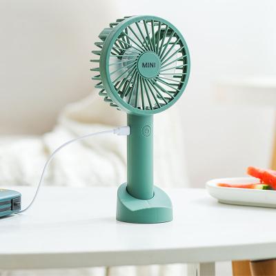 China Easy Carry Mini Macaron Color 5V Air Cooling Rechargeable Table Fan Portable Handheld Usb Fan With Phone Holder for sale