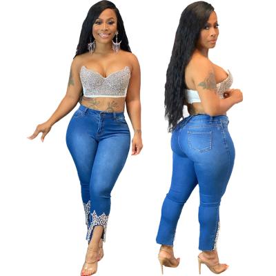 China Breathable hot sale three-dimensional beaded crown printing decoration pencil pants denim plus size women's pants for sale