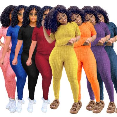 China 2021 Breathable Two-piece Suit Round Neck Solid Color Yoga Pants Women's Casual Two-piece Short Sleeve Hot Sportswear for sale