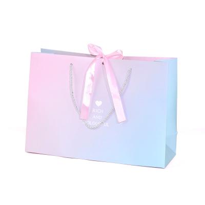 China Recycled Materials Wholesale Custom Goods Bag Present Document Bag Large Wedding Logo Gift Bag With Ribbon for sale