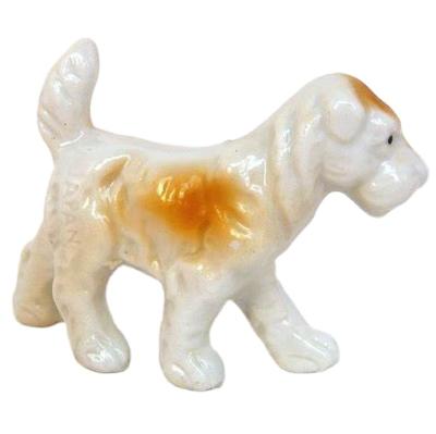 China Europe Dog Custom Ceramic Porcelain Small Dog Figurines for sale