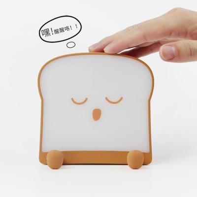 China Cute night light USB modern creative toast expression single and double side lights are also mobile phone bracket button switch for sale