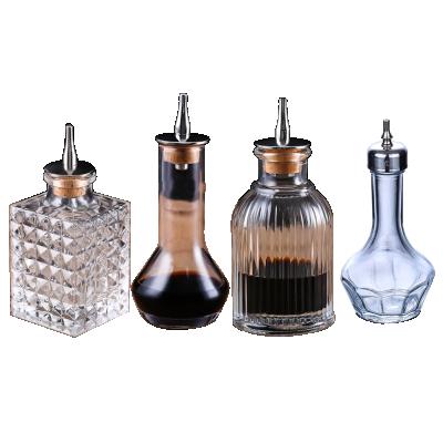 China Sustainable Classic 50ml Bitter Bottle Beveled Bitter Bottle Glass Bitter Liquor Pourer for sale