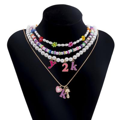 China Environmentally Friendly Rainbow Multilayer y2k Necklace For Women Flower Pearl Necklace Heart Crystal Pendant Jewelry 2022 Handmade Girls Boho Smiley for sale