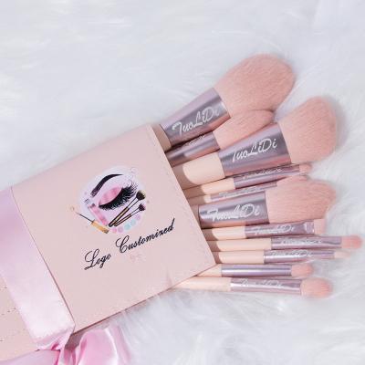 China Angular Blush Custom Logo 11pieces TuoLiDi Pink Makeup Brush Set Private Label Rose Vegan Make Up Brush Set Wooden Handle With Bag for sale