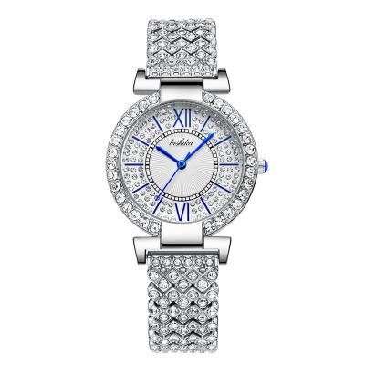 China Hot Sale Fashion Non-Specific Luxury Waterproof Round Diamond Quartz Ladies Watch Stainless Steel Watch for sale