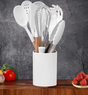 China 11-Piece White Non-Stick Silicone Kitchen Cooking Utensils Set Wooden Handle Utensils with Holder for Storage for sale