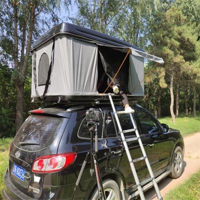 China Cheapest OEM anti water 4X4 noise fiberglassAutomatic hard shell roof top tent for sale