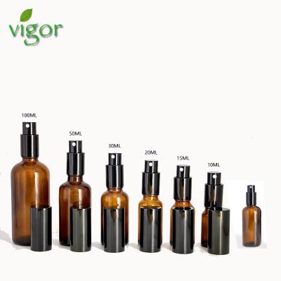 China Minimalist Style Cosmetic Spray Bottles 5ml 10ml 15ml 20ml 30ml 50ml 100ml Essential Oil Packaging Amber Glass Bottle With Black Pump for sale