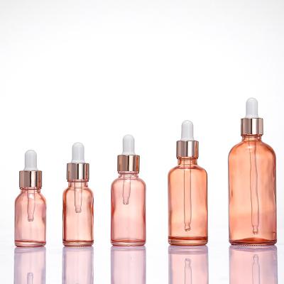 China Custom Cosmetic Packaging 5ml 10ml 15ml 20ml 30ml 50ml 100ml Rose Gold Glass Dropper Essential Oil Bottle for sale