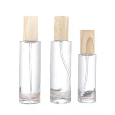 China Personal Care 20ml 30ml 40ml 50ml 80ml 100ml 120ml Flat Shoulder Frosted Travel Lotion Glass Bottle With Bamboo Lid for sale