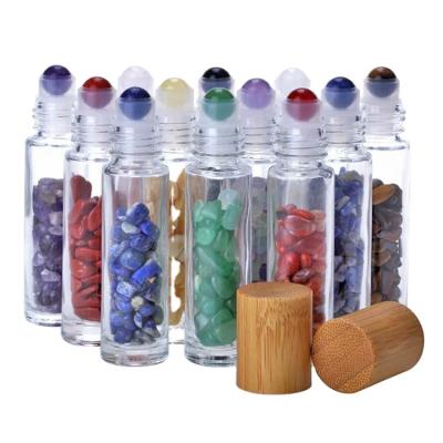 China Easy To Carry High End Eco - Friendly Essential Oil Cosmetic Gemstone Packaging Roll Glass Bottle With Bamboo Cap for sale