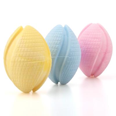 China Amazon New Stocked Wholesale Pop Pet Toys Scented TPR Foam Milk Rugby Ball Tooth-grinding and Bite-Resistant Dog Toys for sale