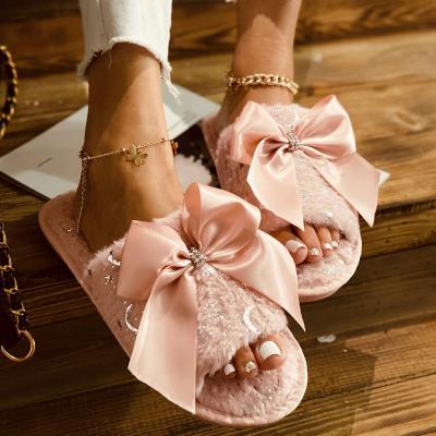 China CUSHIONING 2021 Designer Bow Plush Sandal Fur Home Shoes Girl Plastic Flat Women's Sandals for sale