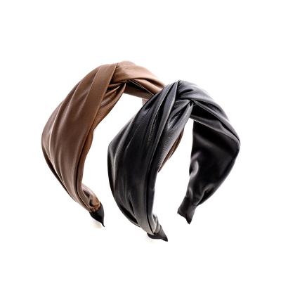 China 2021 fashion wholesale wide cross knotted make up simple leather headband for sale