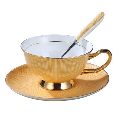 China Viable ZC Bone China Coffee Cup With Spoon Gold-Painted Creative British Wholesale Ceramic Tea Cups And Saucers Black Tea Cup Coffee Set for sale