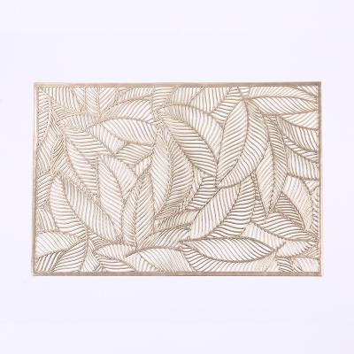 China ZC viable hotel restaurant leaves tan simple nordic style heat insulation place mats decorative hollow western dining table mats for sale