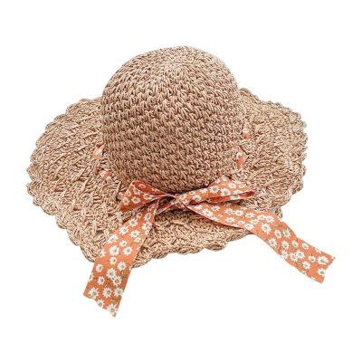 China Sunproof Women's Summer Beach Breathable Outdoor Manual Sun Ribbon Bow Ribbon Straw Hat for sale