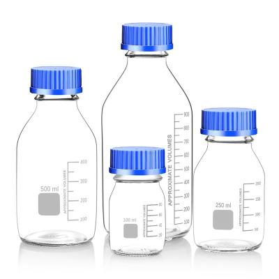 China Lab Analysis 500ml 17oz Clear Chemical Glass Bottle With Scale Mark Reagent Bottle With Blue Lid for sale