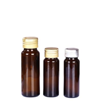 China Daily Life 50ml 100ml Round Amber Syrup Oral Liquid Pharmaceutical Screw Cap Medicine Glass Bottle for sale