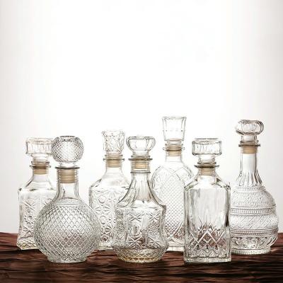 China Beverage China OEM Wholesale 50ml 100ml 150ml Empty Glass Bottles Small Whiskey Bulk Decanter Glass Wine Bottle for sale