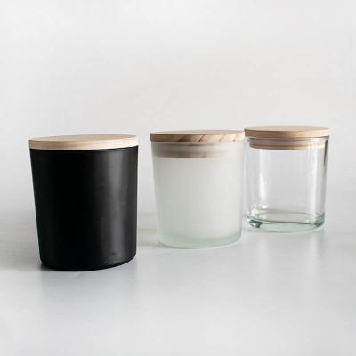 China Home Decor Wholesale 10oz Matte Black Soy Wax Container Unique Clear Frosted Glass Candles Jars Ships With Wooden Lid for sale