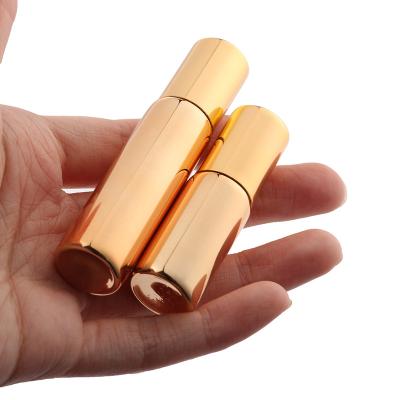 China 5ML 10ML Eye Cosmetic Gold Amber Fullfill Glass Roll On Vials Brown Essential Oil Smear Test Bottle Slim Glass Bottle With Metal Ball for sale