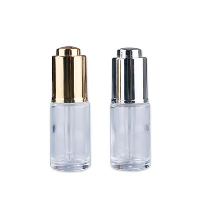 China Custom Clear Cosmetic Skin Care Serum Essential Oil Cylinder 15ml 30ml 50ml Glass Cosmetic Bottle With Dropper Push for sale