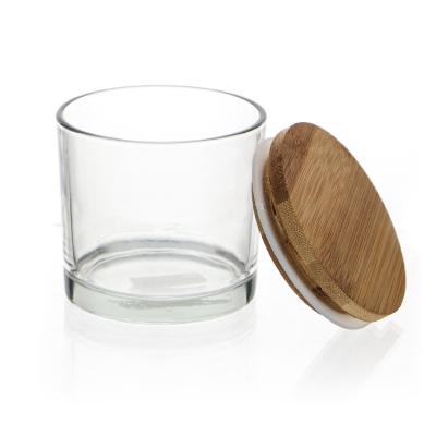 China Wholesale Empty Glass Home Decor Candle Jars In Bulk For Candle Making With Wooden Lids for sale