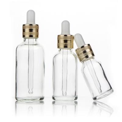 China Wholesale 2oz 20ml 30ml 100ml Luxury Cosmetic Eye Oil Serum Face Clear Glass Bottles With Dropper for sale