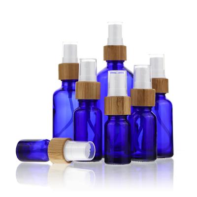 China Custom Luxury Empty Blue Round Cosmetic Eyelash Serum Glass Face Sprayer Bottles 10ml 20ml 30ml 40ml 50ml 10ml for sale