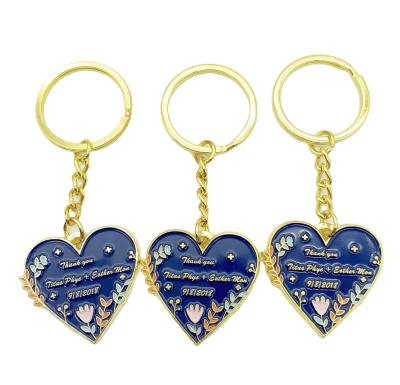 China Simple Beautiful Golden Ring Metal Key Holder Key Chain With Flower English Design Heart Graffiti Key Chain for sale