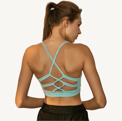 China New Cross-Back Cavity Breathable Sports Bra Underwear Yoga Sports Bra For Woman for sale