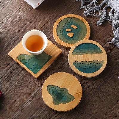 China Table Decoration Heat Insulation Stocked Coasters Around Match Bamboo Creative Resin Transparent Cup Coaster for sale