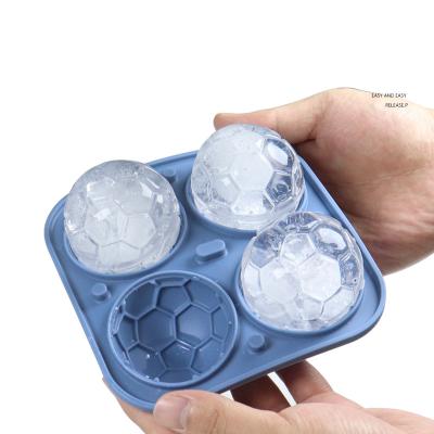 China Viable 4 Holes 3D Whiskey Drinks Ice Cube Maker Mold Trays Sphere Football Shapes Pallet Silicone Ice Cube Trays Moldes With Lid for sale