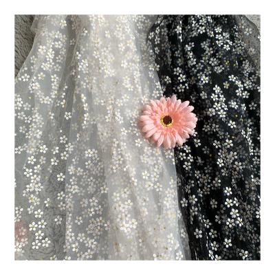 China Breathable 2022 flower fabric design polyester tulle printed polka dot girl dress plum flower pattern for sale