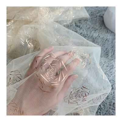 China Breathable Luxury clothing fabric nylon bronzing film rose wedding dress fabric textile raw materials for sale