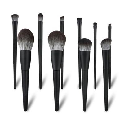 China Angular Blush 10pcs High Quality Professional Makeup Brush Set Black Wood Handle for sale