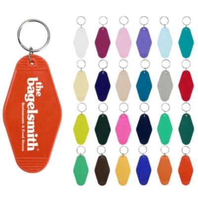 China Custom colorful hot stamping retro souvenir gifts logo motel hotel room plastic key chain for sale