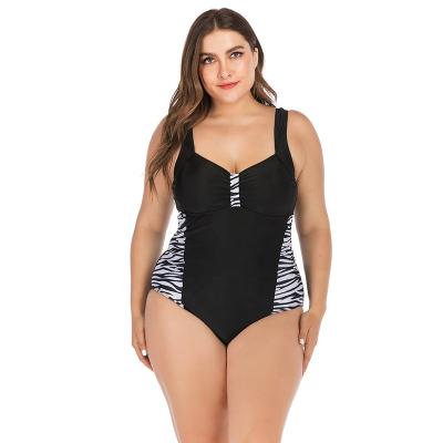 China Plus Size Hollow Side Waist Strap Swimsuit One Piece Sexy Backless Plus Size Bathing Suit for sale