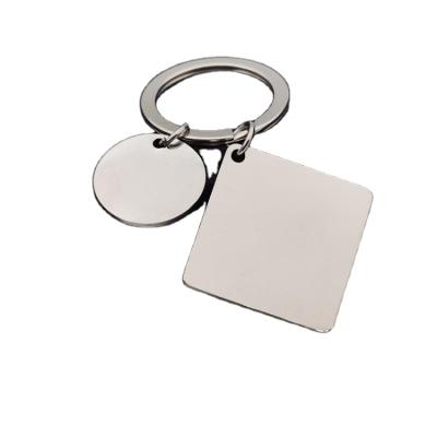 China Beautiful Fashionable Stainless Steel Key Chain Jewelry Round Key Chain Couple Stamped Key Chain Gift for sale