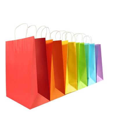 China Recycled Materials Wholesale Custom Colored Paper Bag Kraft Paper Gift Bag With Handle for sale