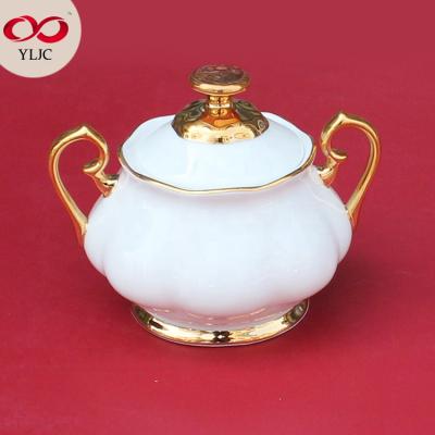 China Nordic Viable White Sugar Pot Bone China Coffee Pot Set Gold Rim Flower Shape Ceramic Sugar Pot for sale