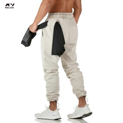 China Antibacterial fashion casual men's sports pants stretch rope training pants basketball fitness pants custom logo for sale