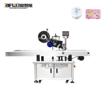 China Automatic CLOTHING Carton Box Labeler Round Corner Labeling Machine for sale