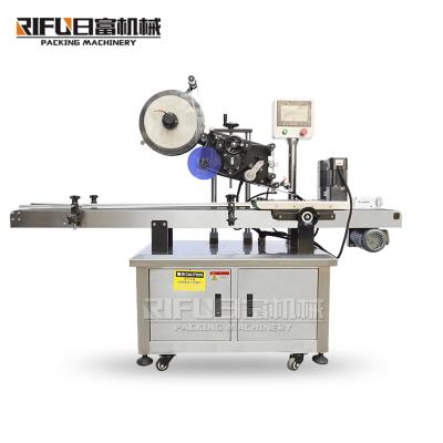 China Beverage flat surface label applicator plastic bag labeling machine on hot sale for sale