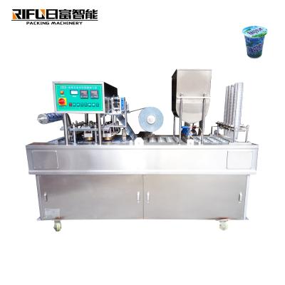 China Automatic Food Water Juice Jelly Milk Cup Filling Sealing Machine for sale